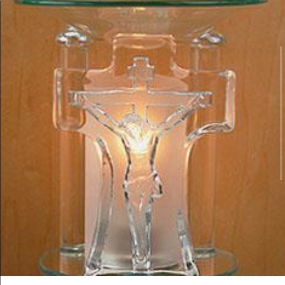 Reglious oil/tart burning electric plug in.